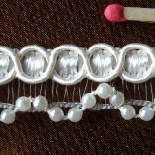 Perlas de rayas de encaje...