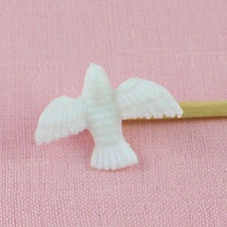 Miniature white plastic dove