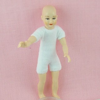 Miniature child character...