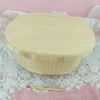 Oval wooden box with...