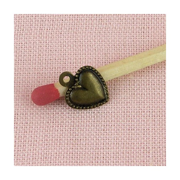 Breloque coeur miniature pendentif 8 mm.