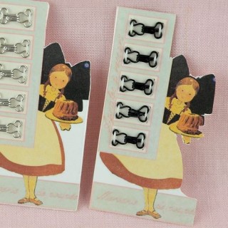 Small hooks and eyes sew on a vintage card, 7 mms.