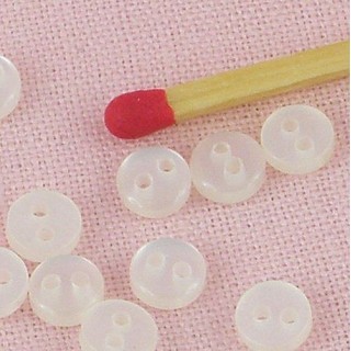 Small bulging pearly buttons, 5 mms..