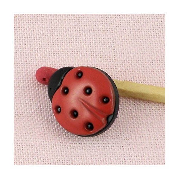 Bouton coccinelle 15 mm.