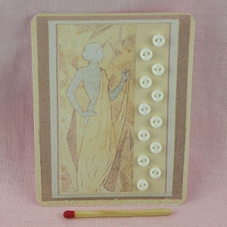 Vintage card of tiny matt buttons