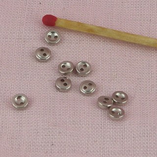 Boutons minuscules argentés 4 mm.