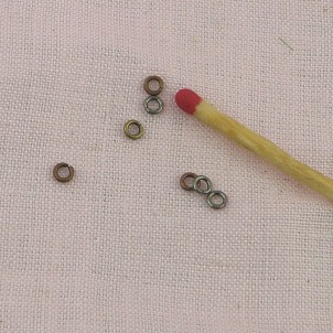 Perles rondes bronze, sertissage 2,5mm.