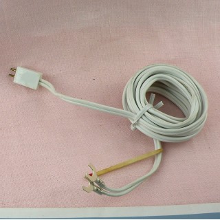 Electric extension lead for doll house .