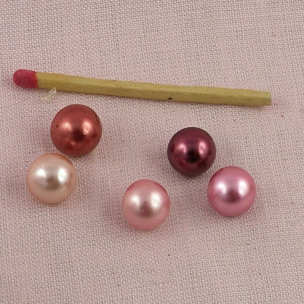 Boton perla nacarada rueda 1 cm.