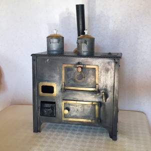 Wood-burning stove dollhouse kitchen.