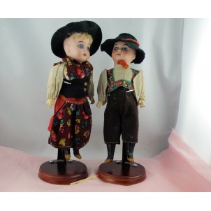Paar deutscher Puppen aus Porzellan und Zusammensetzung 22 cm.