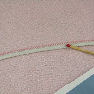 Embroidered stripped piping ribbon 3 mm.