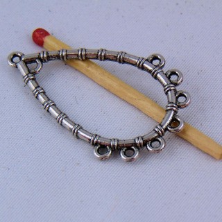 Charm pendentive forms drop out of openwork metal 4 cm