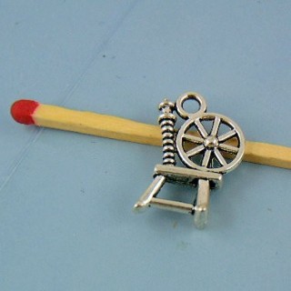 Breloque rouet miniature en métal 1 cm