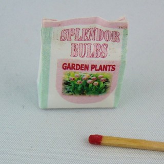 Seed pack and display miniature for doll house.