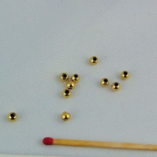 10 Perles ronde dorées 3 mm.
