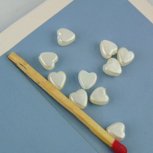 10 plastic hearts beads 6 mm.
