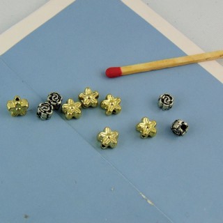 10 Perles fleurs couleur métal plastique 6 mm.