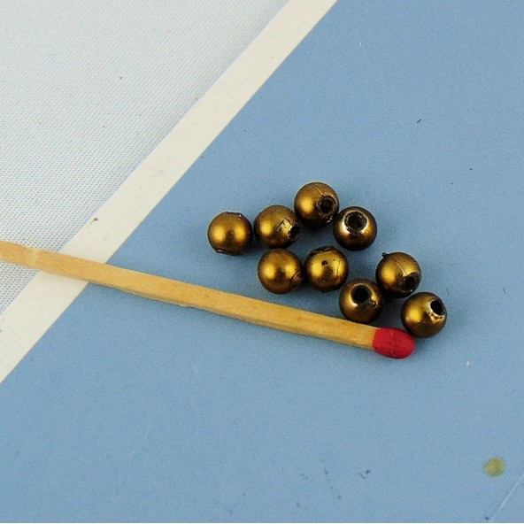 10 perlas redondas doradas de 4 mm.