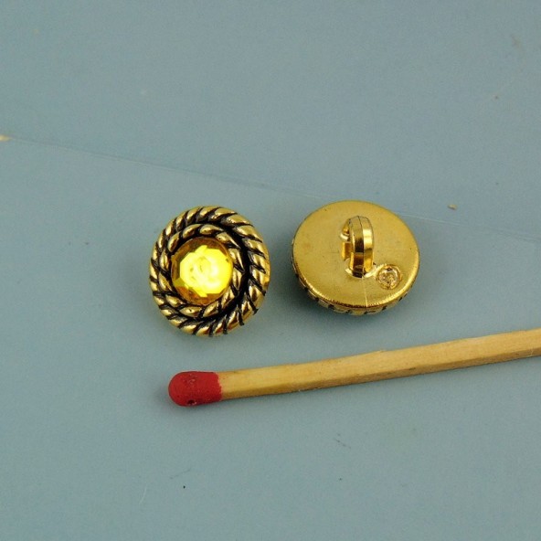 Yellow rhinestone button on foot 13 mm.