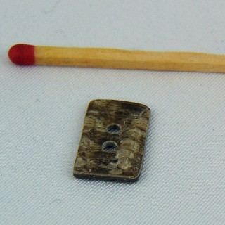 Rectangular buttons in haberdashery 2 holes, 6 mm.